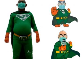 Camat Sawahan M Yunus dengan pakaian New Man dan posenya yang dibuat ikon kartun yang tersebar di media sosial. (foto repro tangkapan layar Instagram @bpblinmas.surabaya)