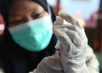 Ilustrasi vaksinasi booster.