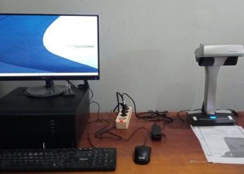 Rancangan mesin scanner dan program database digital dokumentasi kependudukan yang dirancang ITS untuk Dispendukcapil Kota Surabaya.