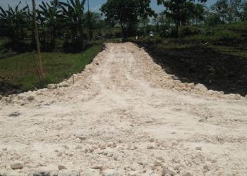 Pembangunan jalan makam di Desa Kedungadem, Kecamatan Kedungadem, Kabupaten Bojonegoro.