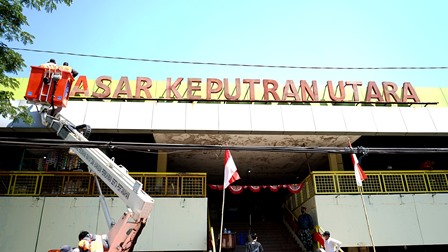 Pengecatan yang dilakukan di Pasar Keputran Utara.