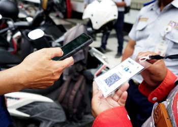 Pembayaran parkir menggunakan QRIS yang sudah diterapkan di beberapa titik di Surabaya.