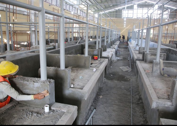 Pengerjaan pembangunan Pasar Karah yang progresnya sudah mencapai 90 persen.