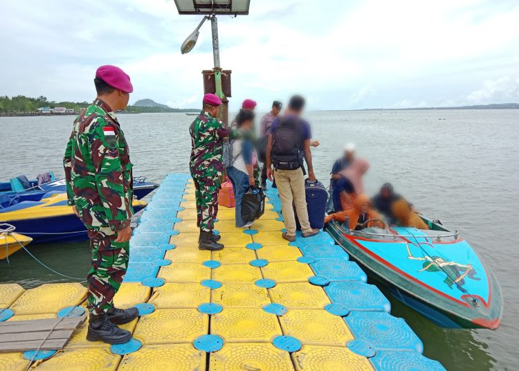 Para calon pekerja migran Indonesia yang diamankan sebelum menyeberang Malaysia.