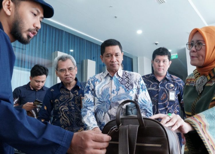 Asisten Deputi Penguatan Ekosistem Kementerian Koperasi dan UMKM RI Christiana Agustin APi MM dalam kegiatan Entrepreneur Hub Jawa Timur 2025.