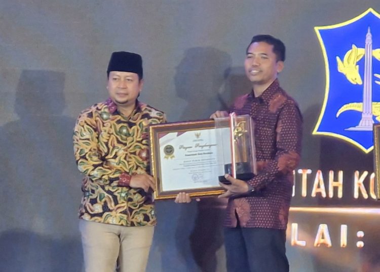 Penganugerahan Keterbukaan Informasi Publik  Tahun 2025 yang diselenggarakan oleh Komisi Informasi Jawa Timur di Bojonegoro.