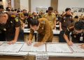 Penandatangan Perjanjian Kerja Sama dengan Kejaksaan Negeri Surabaya dan Kejari Tanjung Perak terkait penerapan pidana sanksi sosial dengan Pemkot Surabaya.