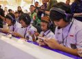 Suasana gelaran Grand Tournament Mobile Legends: Bang Bang Goes To School 2025 di Atrium Tunjungan Plaza 3, Surabaya.