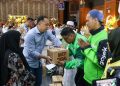Pembagian santunan kepada anak yatim, disabilitas, dan driver ojek online