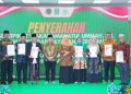Gubernur Jatim Khofifah Indar Parawansa saat menghadiri penyerahan sertifikat wakaf serta aset Pemprov oleh BPN Jatim. Gerakan Partisipatif Masyarakat Percepat Sertifikasi Tanah ini merupakan sistem bahwa masyarakat kini memiliki lebih banyak pilihan pembayaran yang aman, praktis, dan terukur.